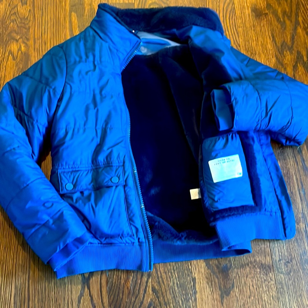 This is a puffy jacket with a soft and fluffy interior!